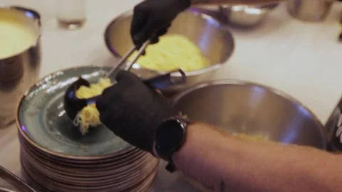 Hands in black gloves making pasta Stock Footage 300028251