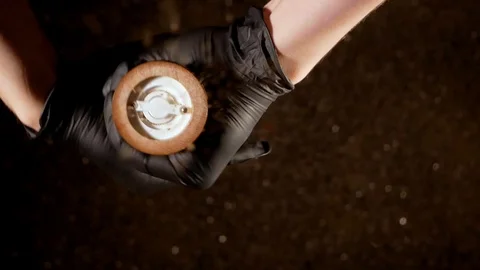 Hands in black gloves spin the mill with pepper. Stock Footage 114250856