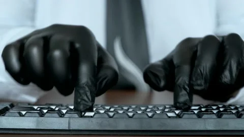 Hands in black gloves typing on the keyboard. Stock Footage 170759021