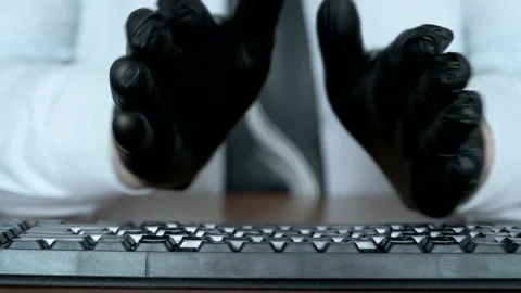Hands in black gloves typing on the keyboard. Stock Footage 171761050