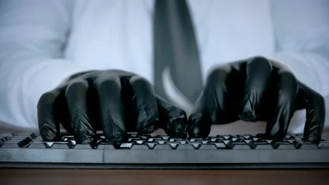 Hands in black gloves typing on the keyboard. Stock Footage 172400477