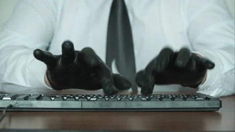 Hands in black gloves typing quickly on keyboard. Stock Footage 170997760