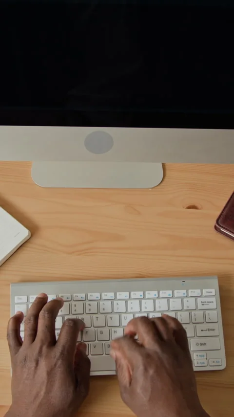 Hands of Black Man Typing Code on Desktop Computer Keyboard for Programming Video stock 347655645