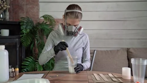 Hands in black nitrile gloves inspecting and removing circular saw blade from Stock Footage 341555140