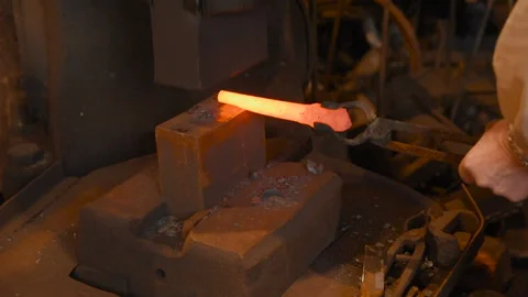 Hands of a blacksmith with a tool Stock-Footage 103750576