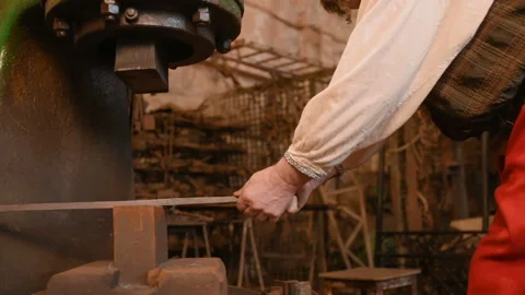 Hands of a blacksmith with a tool Stock-Footage 108618796