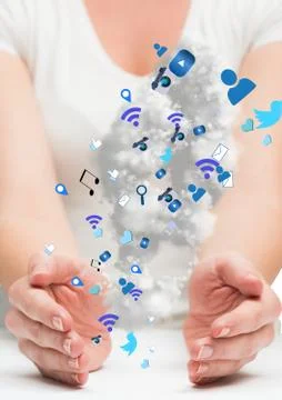 Hands with blue application icons between two hands 스톡 사진