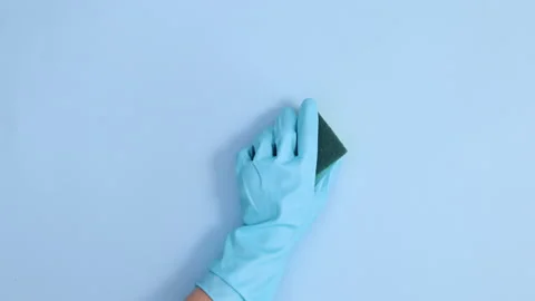 Hands in blue gloves cleaning with sponge and sanitary wiping fluid. Stop motion Stock-Footage 151425838