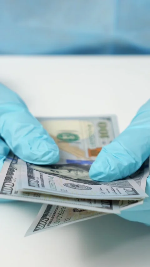 Hands In Blue Gloves Sort Stack Of American Banknotes Above Clean Desk. Worker Stock Footage 347188490