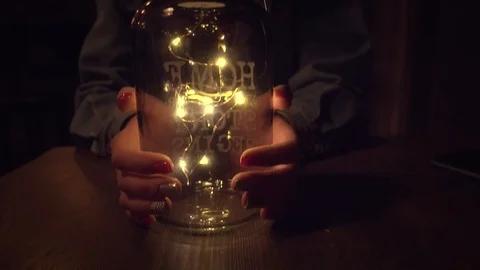 Hands on bottle with lights Video stock 108515102