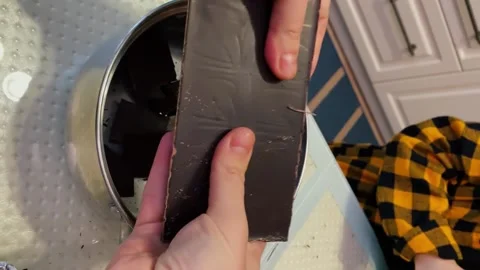 Hands breaking chocolate into pieces Stock Footage 167507010