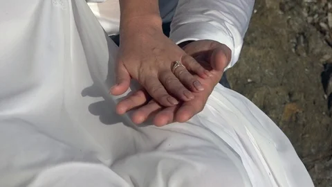 Hands of bride and groom Stock Footage 97704546