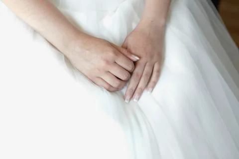 Hands of the bride Stock Photos