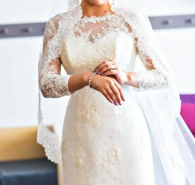 Hands of a bride Stock Photos