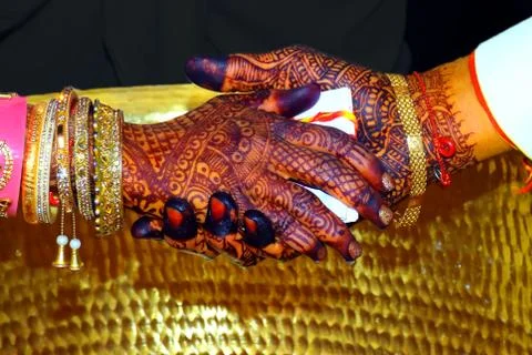 Hands of the the bride Stock Photos