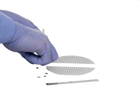 A hands broken multilayer semiconductor silicon wafer Stock Photos