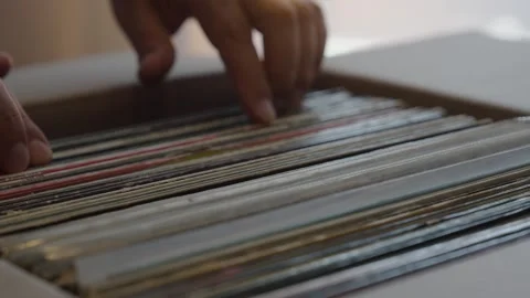 Hands Browsing Vinyl Record Collection in Cardboard Box Stock Footage 344973340
