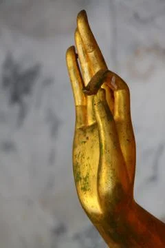 Hands of the buddha Stock Photos