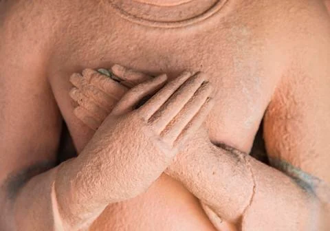 Hands of buddha statue Stock Photos