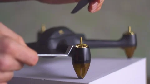 Hands building a copter, drone. Hobby and technology in every day life. Stock Footage 105028033