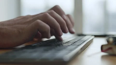 Hands of Business Man Typing Text on Keyboard of Computer Pc in Work Office Stock Footage 241910795