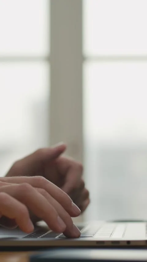 Hands of Business Man Typing Text on Keyboard of Laptop Computer in Work Office Stock Footage 306633767