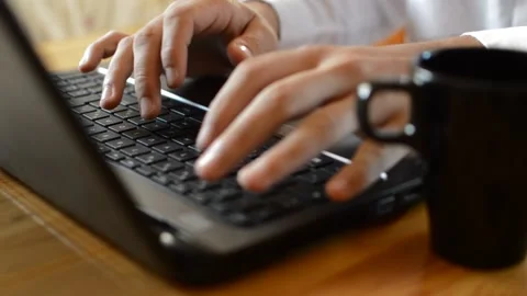 Hands of the business worker take a break from his work on black laptop. Stock-Footage 209184924