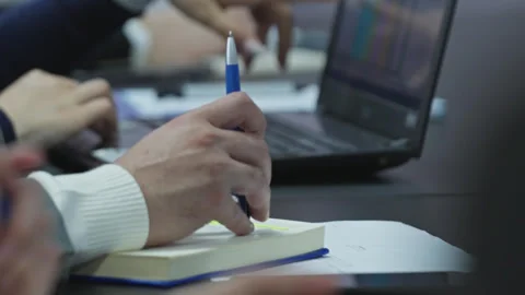 Hands of an businessman in expensive clothes work at computers in the office. Stock Footage 265000676
