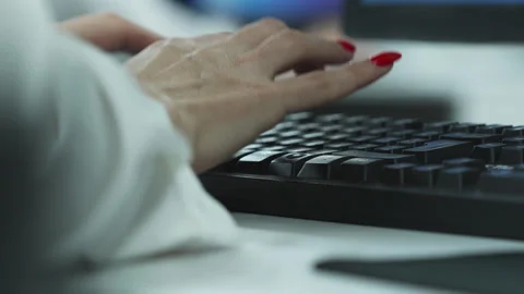 Hands of an businessman in expensive clothes work at computers in the office. Stock Footage 311503979