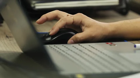 Hands of an businessman in expensive clothes work at computers in the office. Stock Footage 333470739