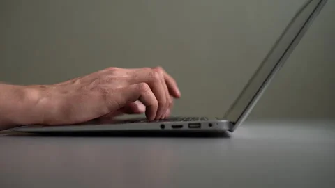 Hands of businessman or programmer typing code on laptop keyboard. Concept of Stock Footage 342758191
