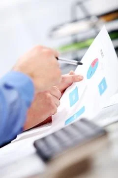 Hands of a businessman on a table Stock Photos