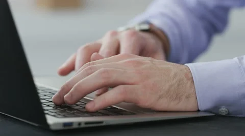 Hands of a businessman working with a laptop computer. Stock Footage 68402686