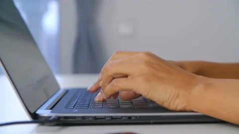 Hands of businesswoman working on notebook computer at home during lockdown Stock Footage 168018076