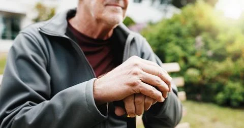 Hands, cane and thinking in backyard with senior person in retirement, bala.. Stock Photos