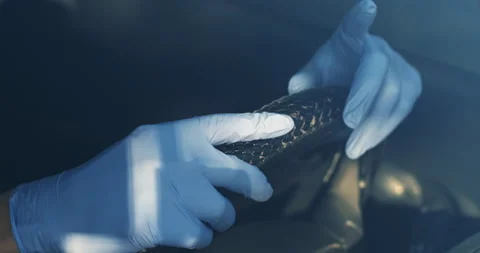 The hands of a car driver in gloves on the steering wheel 動画素材 232949723