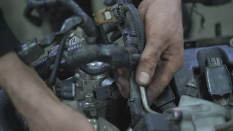 Hands of car mechanic working in auto repair service. Stock Footage 263921918