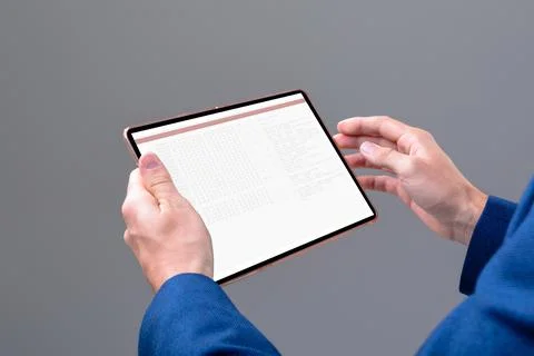 Hands of caucasian male programmer using tablet with coding on screen Stock-Fotos