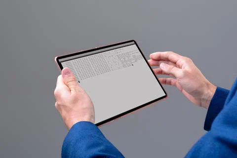 Hands of caucasian male programmer using tablet with coding on screen Stock-Fotos