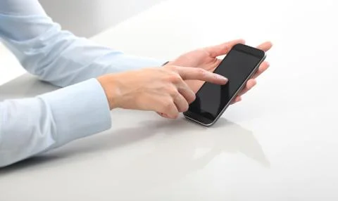 Hands with cell phone Foto stock