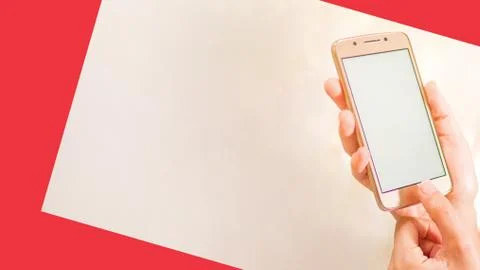Hands with a cellphone with an empty screen on a red and white background. Ph Stock Photos