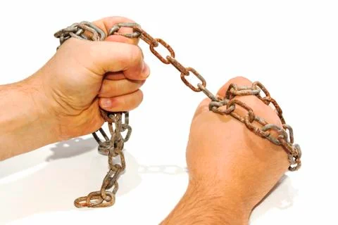 Hands in chains isolated on white background Foto stock