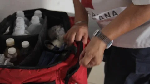 Hands checking emergency equipment - Manos revisando equipo de emergencia Stock Footage 115198436