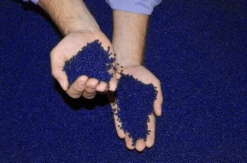 Hands checking polymer resin Stock Photos