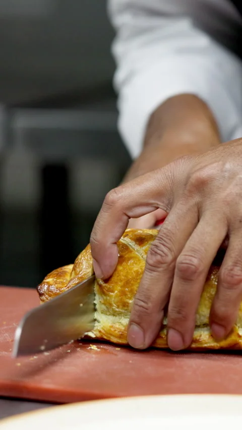 Hands, chef and cutting pie in kitchen, serving and meal prep for order, cuisine Stock Footage 327281822