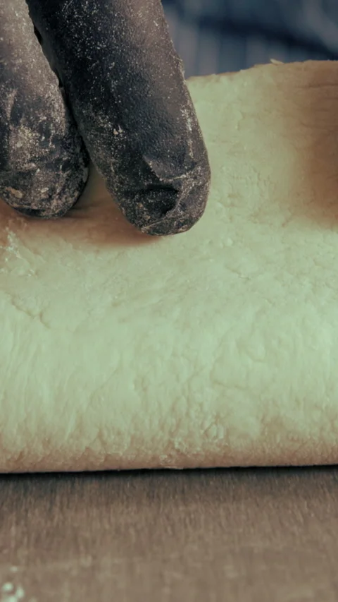 Hands, chef and dough in bakery for pizza, baking and cooking or meal prep in 库存影片 340451065