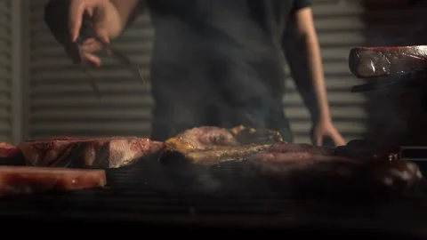 Hands Chef Cooking Steak on Grill Stock Footage 167223849