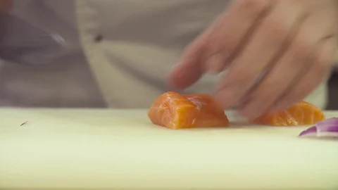 Hands of chef cutting fish Video stock 83593282