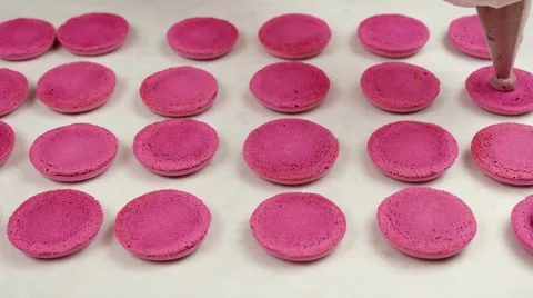 Hands of chef filling Macaroons or Macarons Stock Footage 62426059