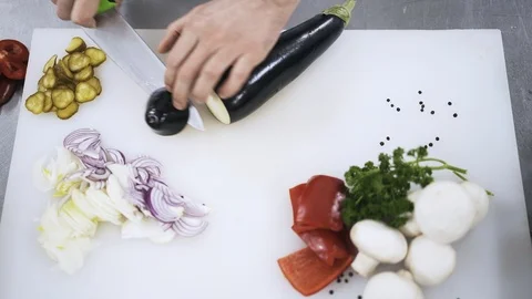 Hands of a chef making eggplant rings Stock Footage 90396035